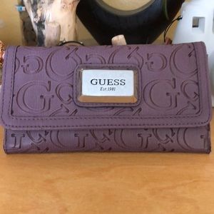 Guess woman’s wallet
